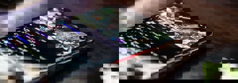 Phone laid on a table playing a stream